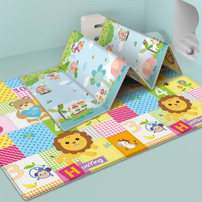Foldable baby play mat with cartoon animals and numbers displayed flat and partially folded in a room setting.