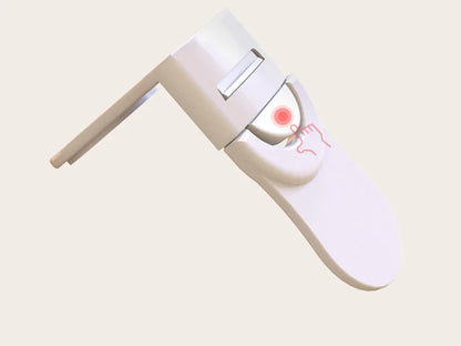 White baby safety drawer lock with finger pressing release button to unlock.