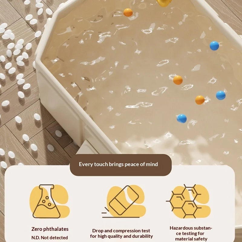 Top view cream foldable baby bathtub with water and colorful balls, safety icons below.