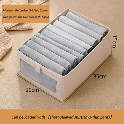 Medium beige foldable fabric storage box with clear window for baby clothes organizer.