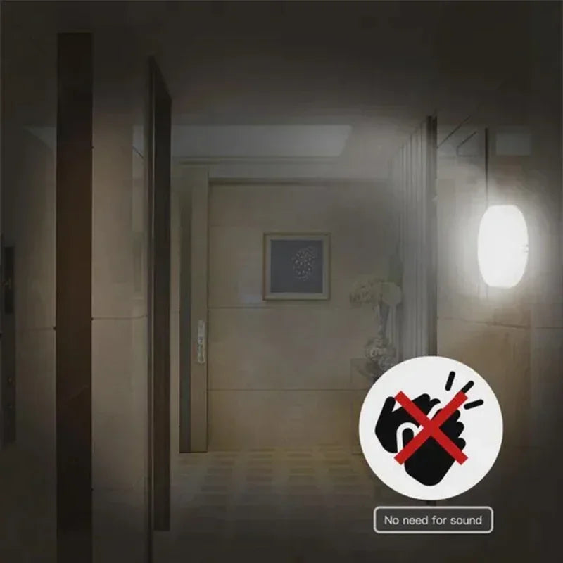 Motion sensor night light glowing in dark hallway with silent activation icon.