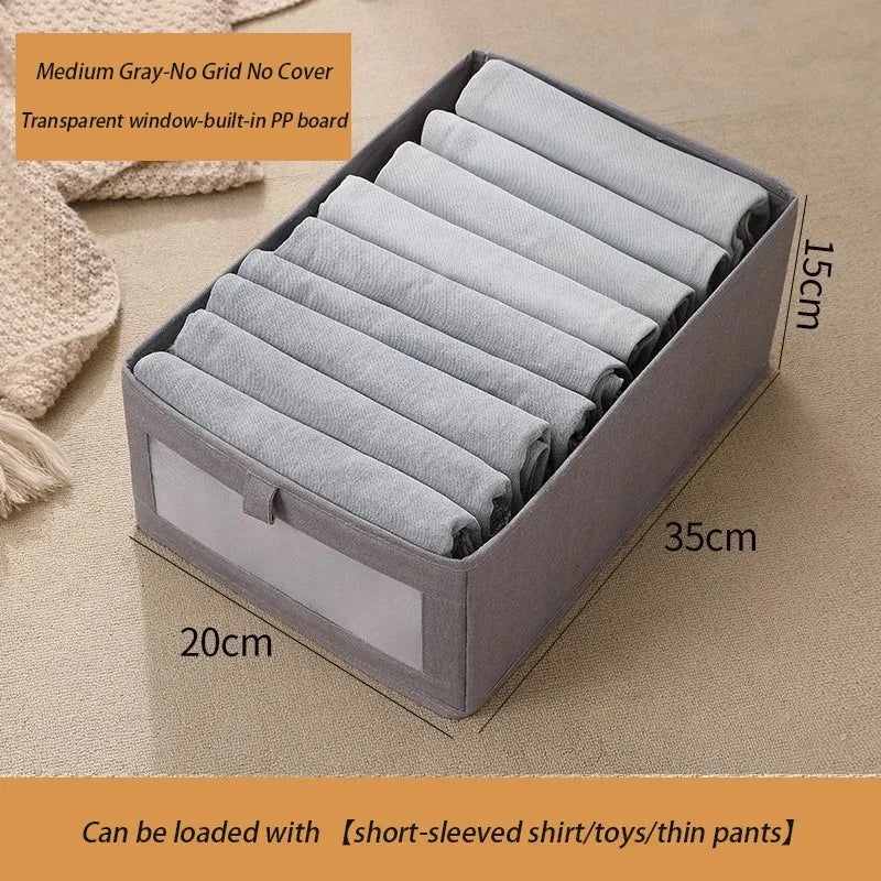 Medium gray foldable fabric storage box with clear window for baby clothes organizer.