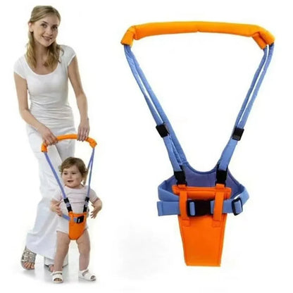 Baby walking harness assistant in use with toddler and adult holding padded handle in orange and blue.