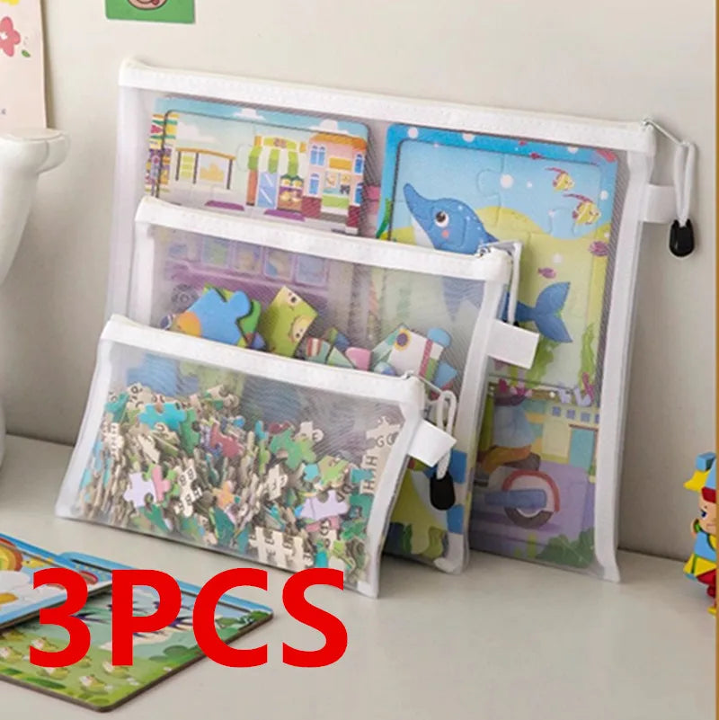 Mesh zipper toy storage bags set of 3 sizes with puzzles inside for kids organization.