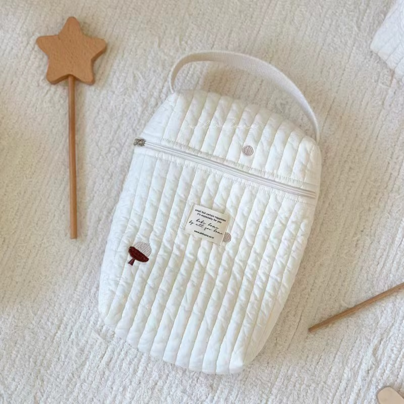 Quilted Diaper Caddy Bag Bear variant with mushroom embroidery on white textured fabric.