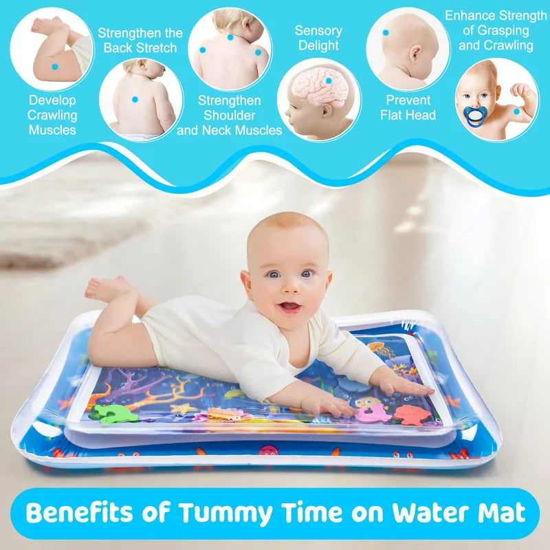 Infant on tummy on blue sea life water play mat showing tummy time benefits.