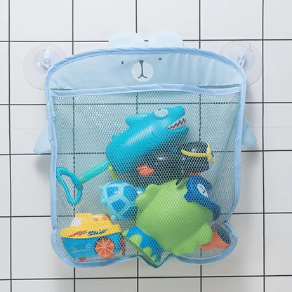Blue bear bath toy storage mesh bag holding bath toys with suction cups attached to wall.