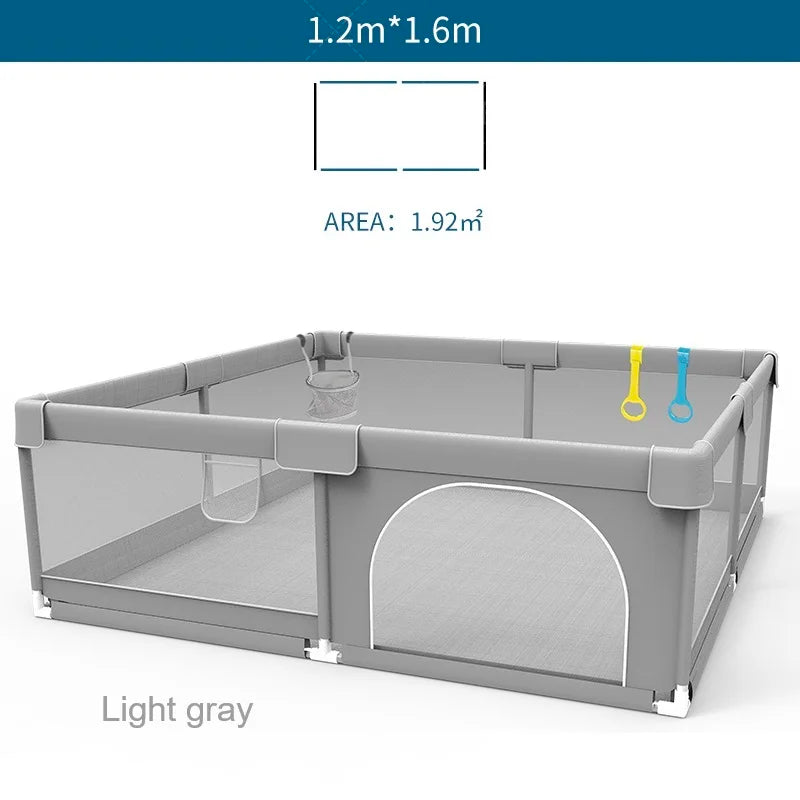 Gray baby playpen with mesh sides and pull rings, 1.2 by 1.6 meters dimensions.