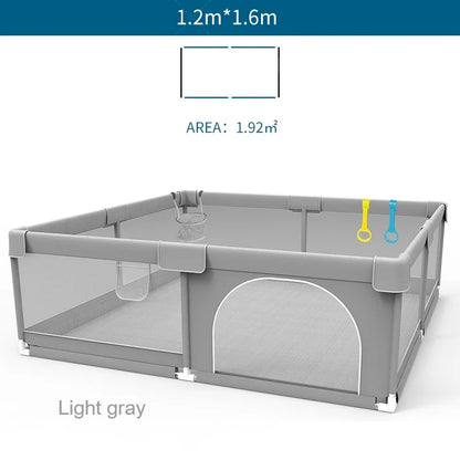 Gray baby playpen with mesh sides and pull rings, 1.2 by 1.6 meters dimensions.