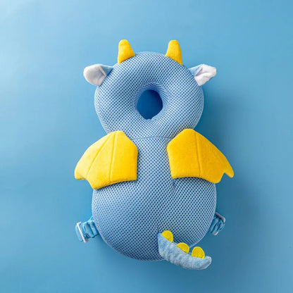 Blue Dragon breathable mesh baby head protection pillow backpack with yellow wings and horns, flat lay.