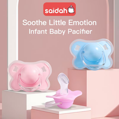 Pink and blue silicone thumb shape baby pacifiers displayed with brand and soothing message.