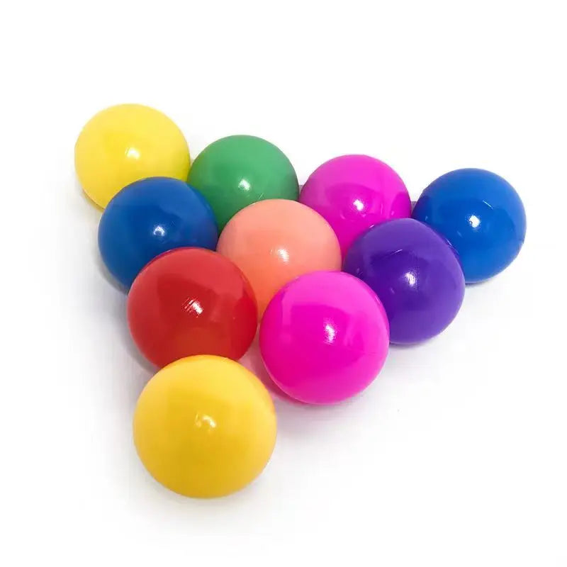 Ten assorted colorful plastic balls from 100-piece play ball set displayed on white background.