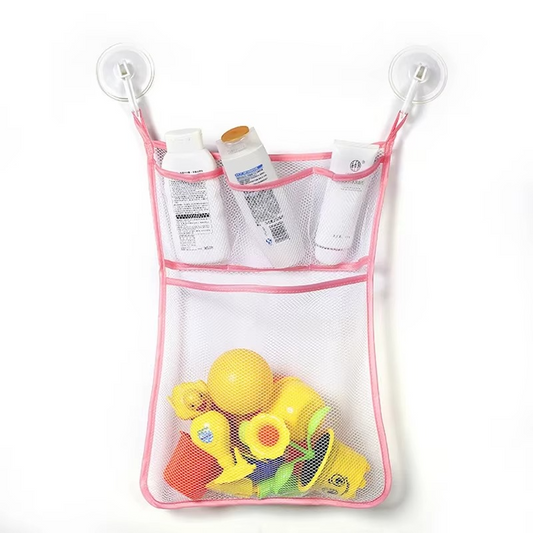 Pink baby bath toy storage mesh bag with suction cups holding bottles and yellow bath toys.