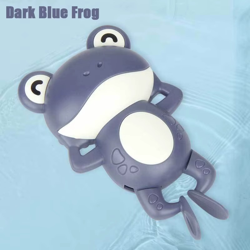 Baby Clockwork Bath Toy dark blue frog floating on water with white belly.