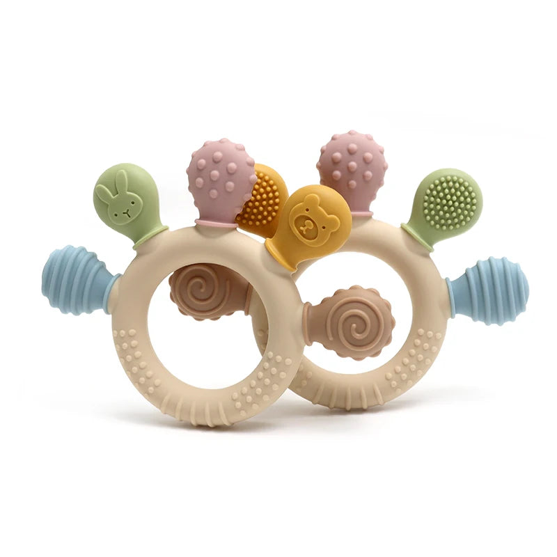 Two pastel silicone baby teething rings with five textured chew heads stacked.