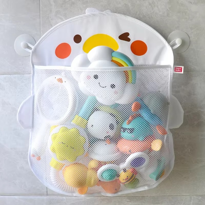 White duck bath toy storage mesh bag filled with baby bath toys, mounted with suction cups.