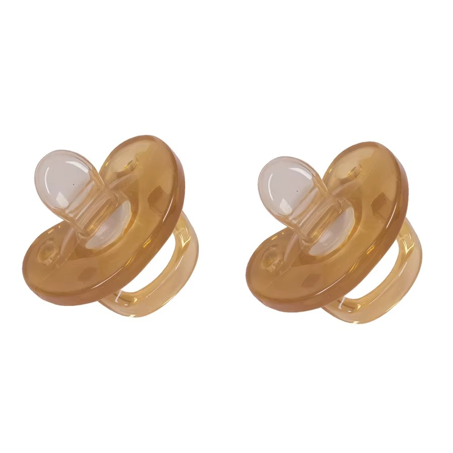 Set of two light brown silicone baby pacifiers with flat nipples and handles.
