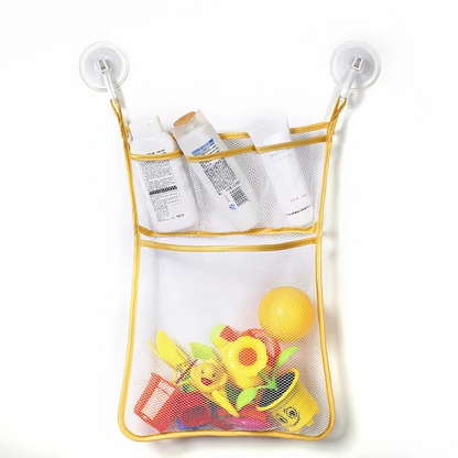 Yellow baby bath toy storage mesh bag with suction cups holding bottles and bath toys.