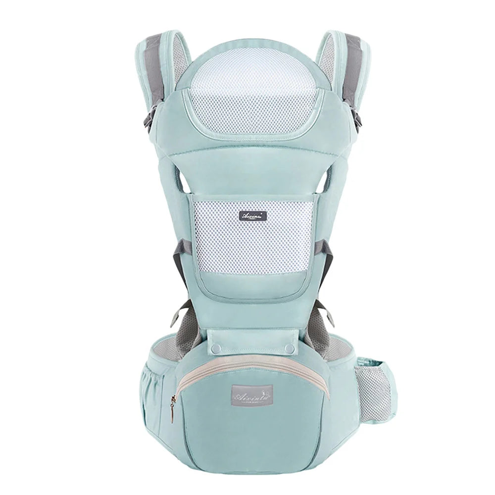 Green ergonomic baby carrier front view with breathable mesh and hip seat.