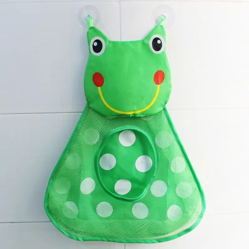 Green frog-shaped baby bath toy storage mesh bag with suction cups and polka dot pocket.