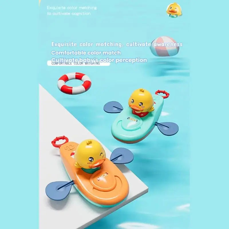 Orange and blue kayak bath toys with yellow ducks floating near pool edge.