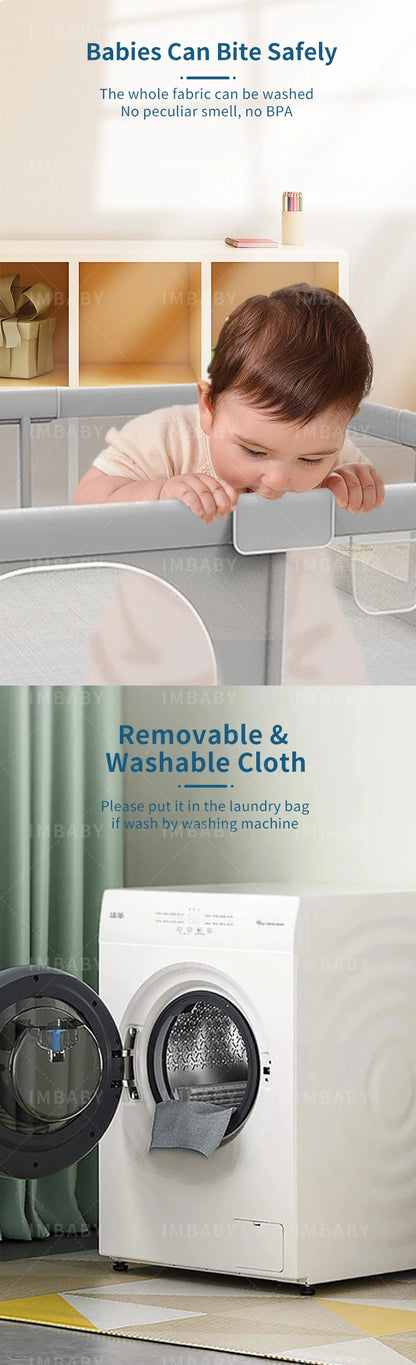 Removable washable cloth cover on gray baby playpen corner being bitten by baby.
