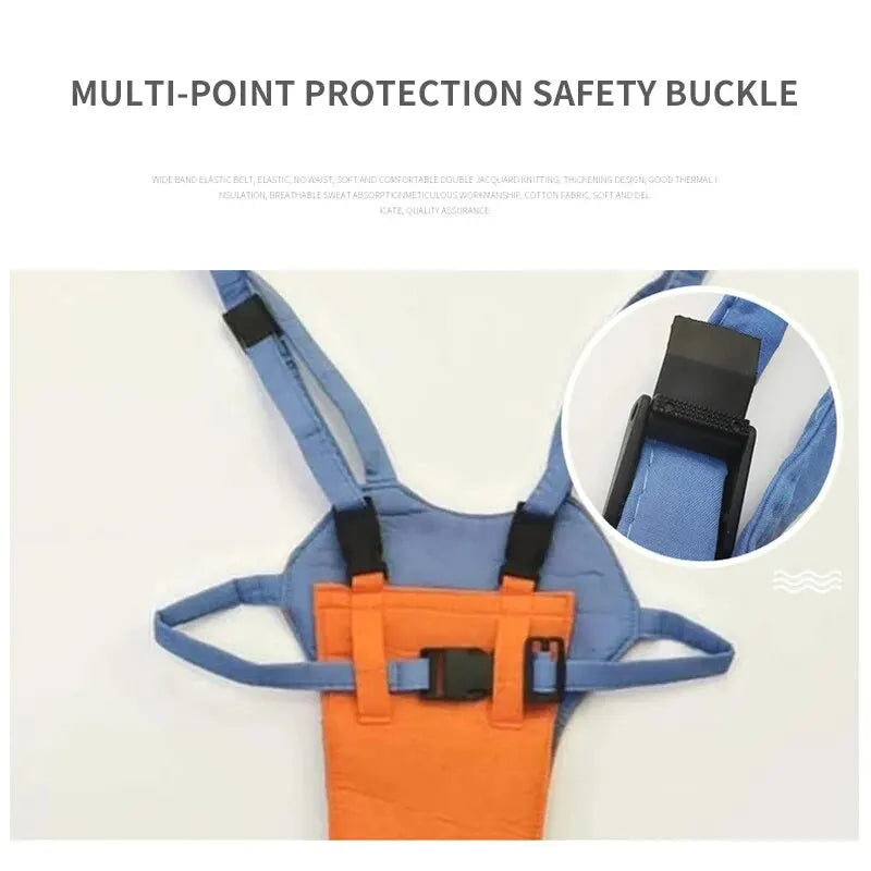 Close-up of multi-point safety buckle on orange and blue baby walking harness assistant strap.