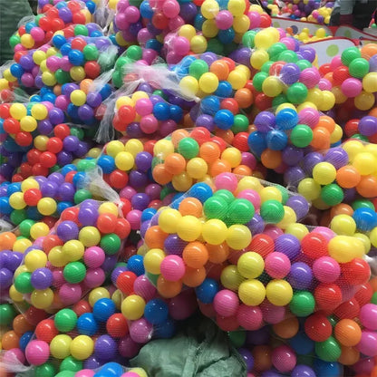 Mesh bags filled with colorful 100-piece play balls ready for storage or sale.