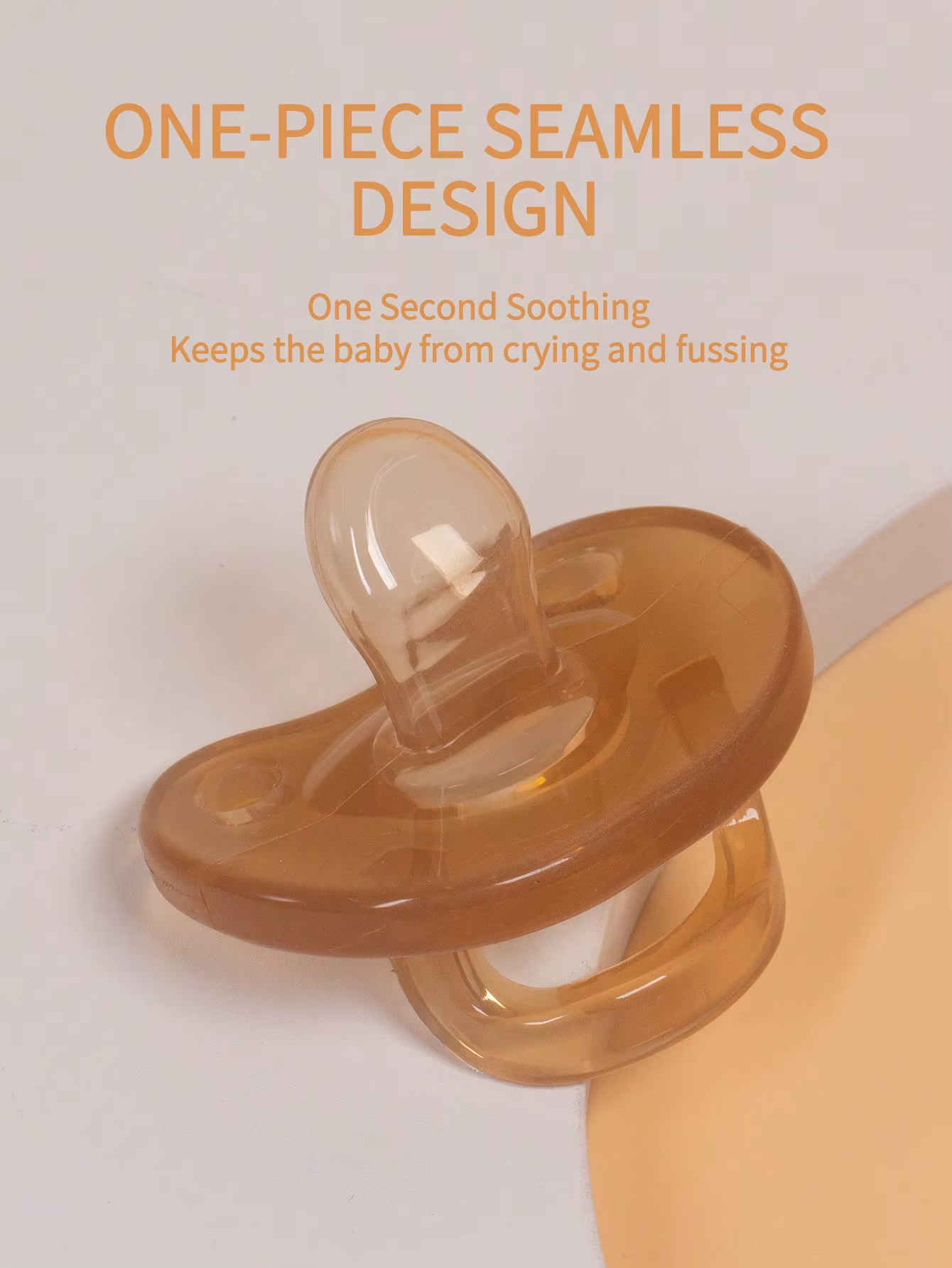 Light brown silicone baby pacifier with flat nipple and handle, seamless one-piece design, view 8.