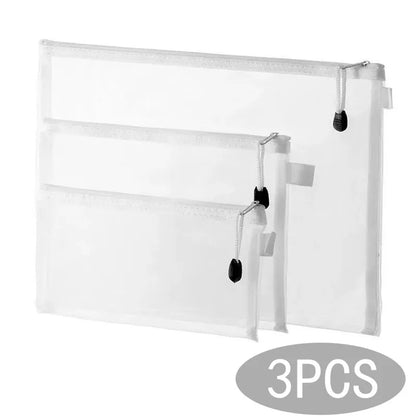 Set of 3 transparent mesh zipper toy storage bags in small, medium, and large sizes.