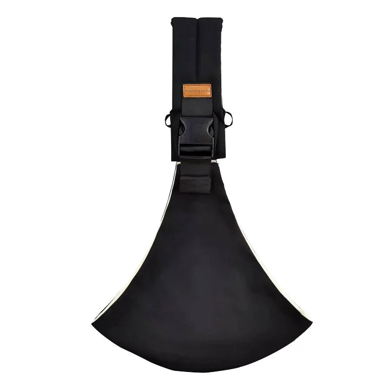 Black adjustable baby carrier wrap with buckle and strap flat lay.