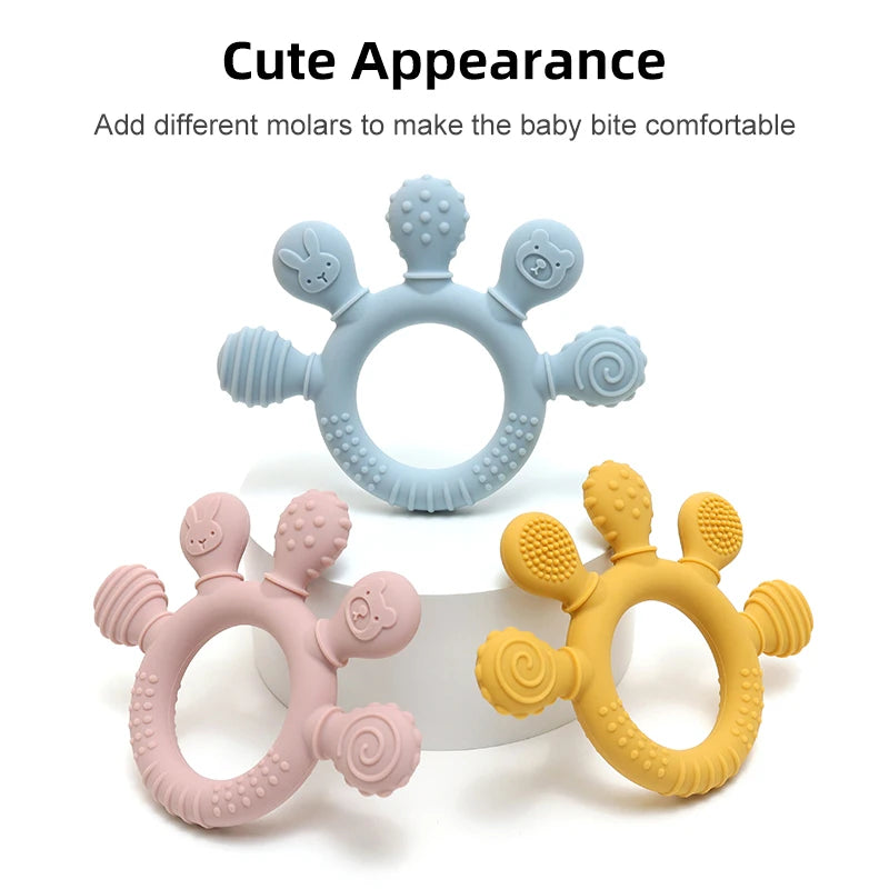 Blue, pink, and yellow silicone baby teething rings with textured chew heads.