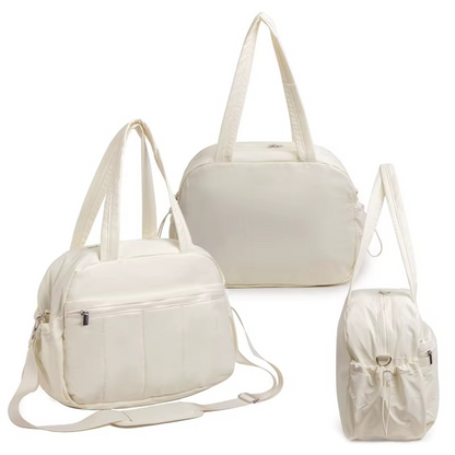 Beige waterproof diaper travel bag shown from front, back, and side angles with multiple compartments.