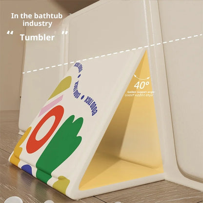 Foldable baby bathtub cover with colorful abstract design propped open at 40-degree angle.