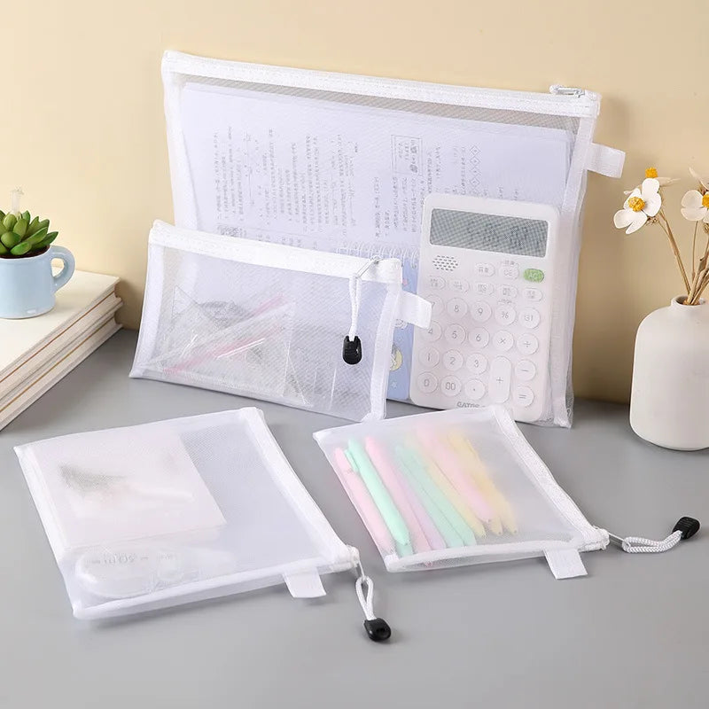 Set of four mesh zipper bags with calculator, papers, and pens for office and school organization.