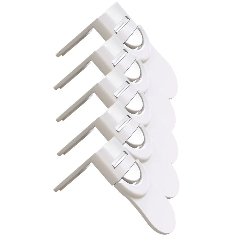 Set of five white baby safety drawer locks displayed fanned out on white background.