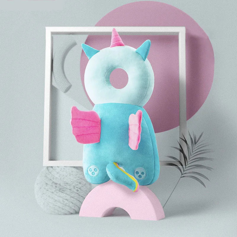 Rainbow Angel plush baby head protection pillow backpack with soft fabric and wing details.