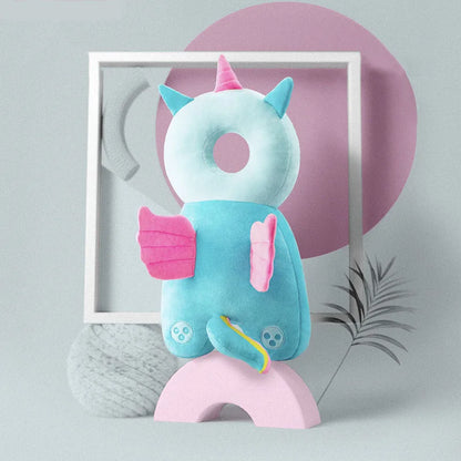 Rainbow Angel plush baby head protection pillow backpack with soft fabric and wing details.