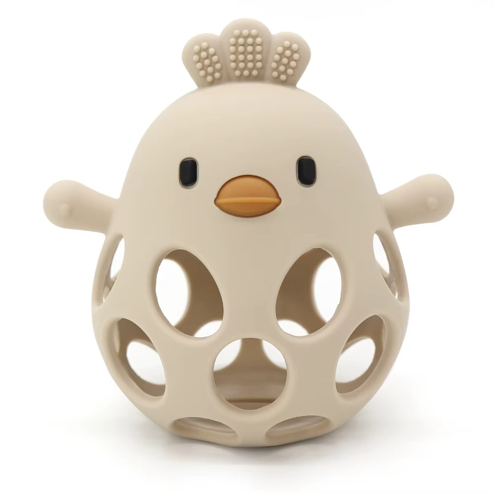 Beige silicone baby teether rattle shaped like a bird with holes and textured comb.