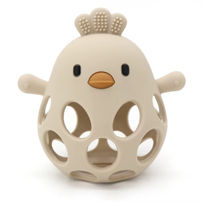 Beige silicone baby teether rattle shaped like a bird with holes and textured comb.