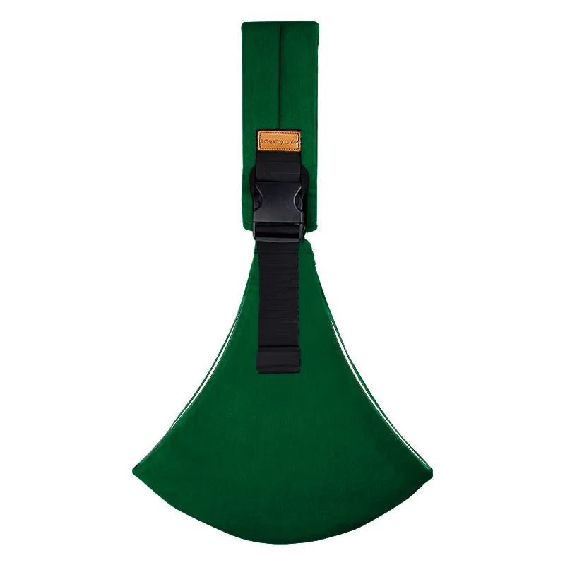 Solid green adjustable baby carrier wrap flat lay with buckle and strap.