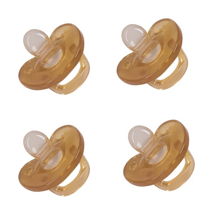 Set of four light brown silicone baby pacifiers with flat breathable design on white background.