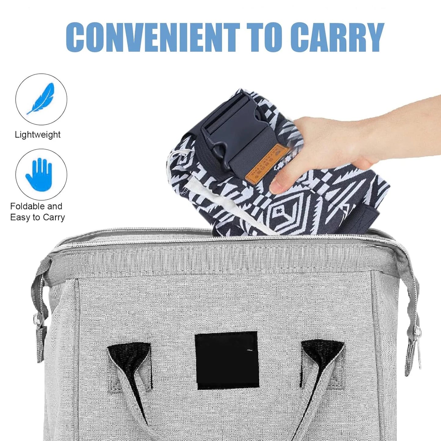 Folded patterned adjustable baby carrier wrap being placed into gray carrying bag.