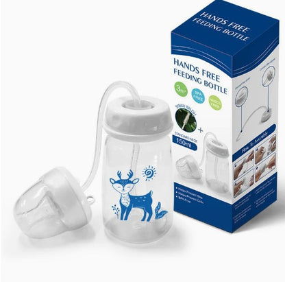 Hands-free baby bottle with blue deer print and gravity ball, shown with packaging box.