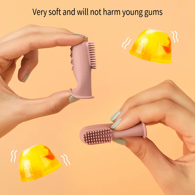 Hands showing flexibility of dark pink baby silicone finger toothbrush for gentle gum care.