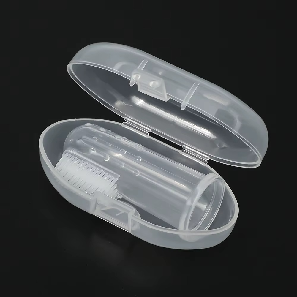 Clear case with clear silicone baby finger toothbrush for infant oral hygiene.
