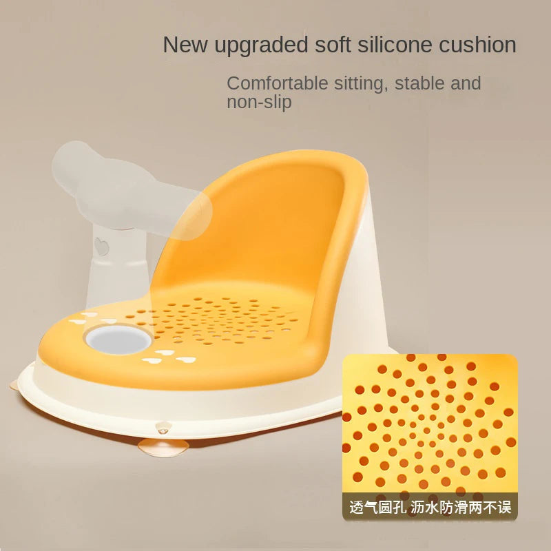 Yellow Comfy Baby Bath Seat with soft silicone cushion and breathable holes detail.